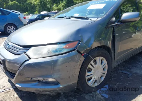 2010 Honda Insight Lx from USA, damaged, VIN JHMZE2H57AS030511